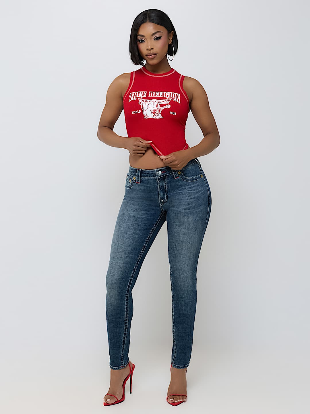 JENNIE MID RISE EMBROIDERED CURVY SKINNY JEAN