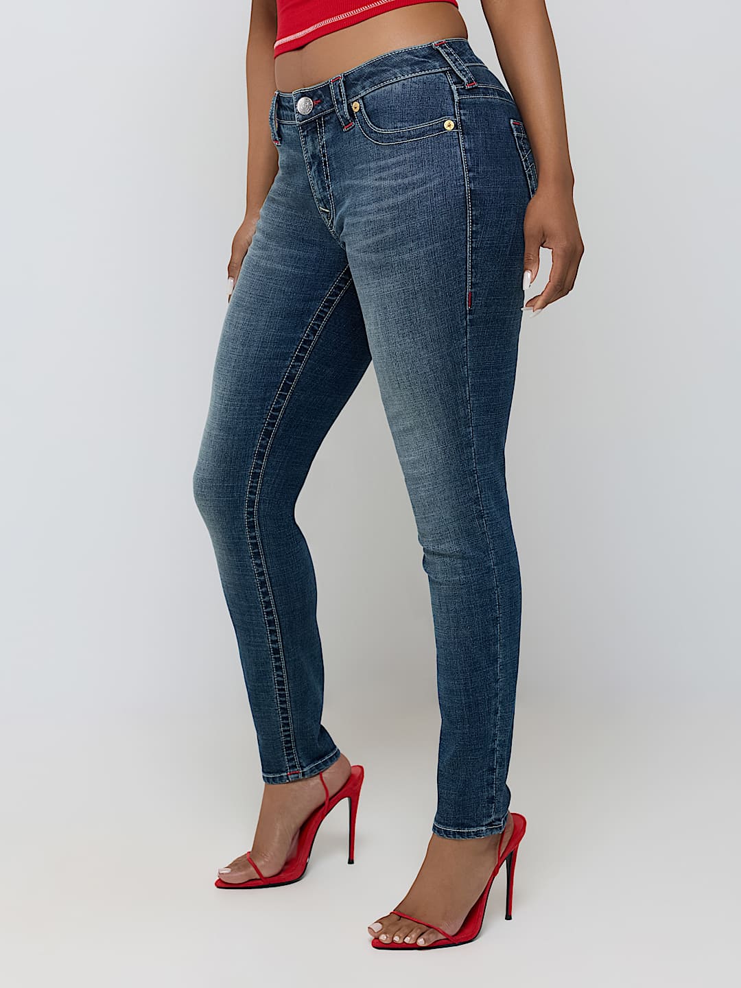 JENNIE MID RISE EMBROIDERED CURVY SKINNY JEAN