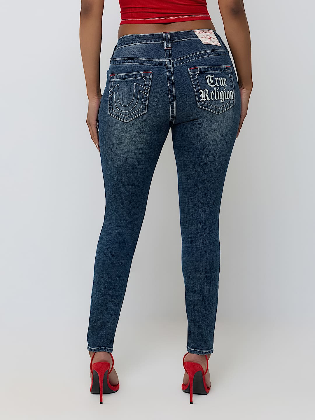 JENNIE MID RISE EMBROIDERED CURVY SKINNY JEAN