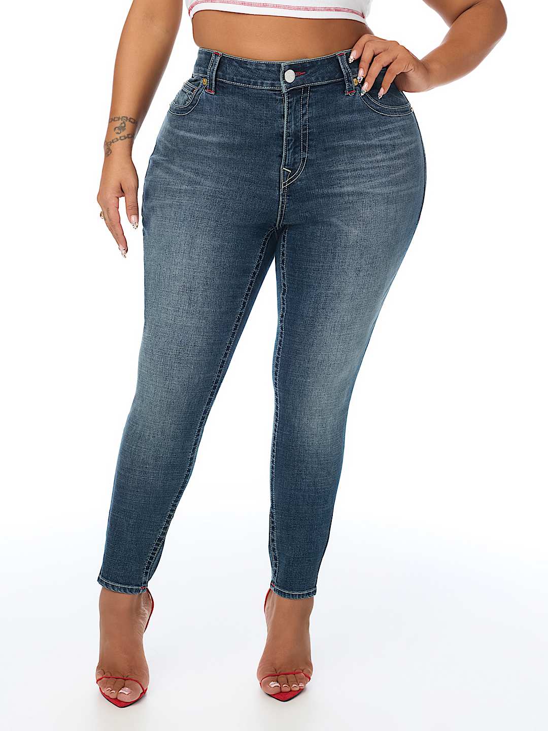 PLUS JENNIE MID RISE EMBROIDERED CURVY SKINNY JEAN 
