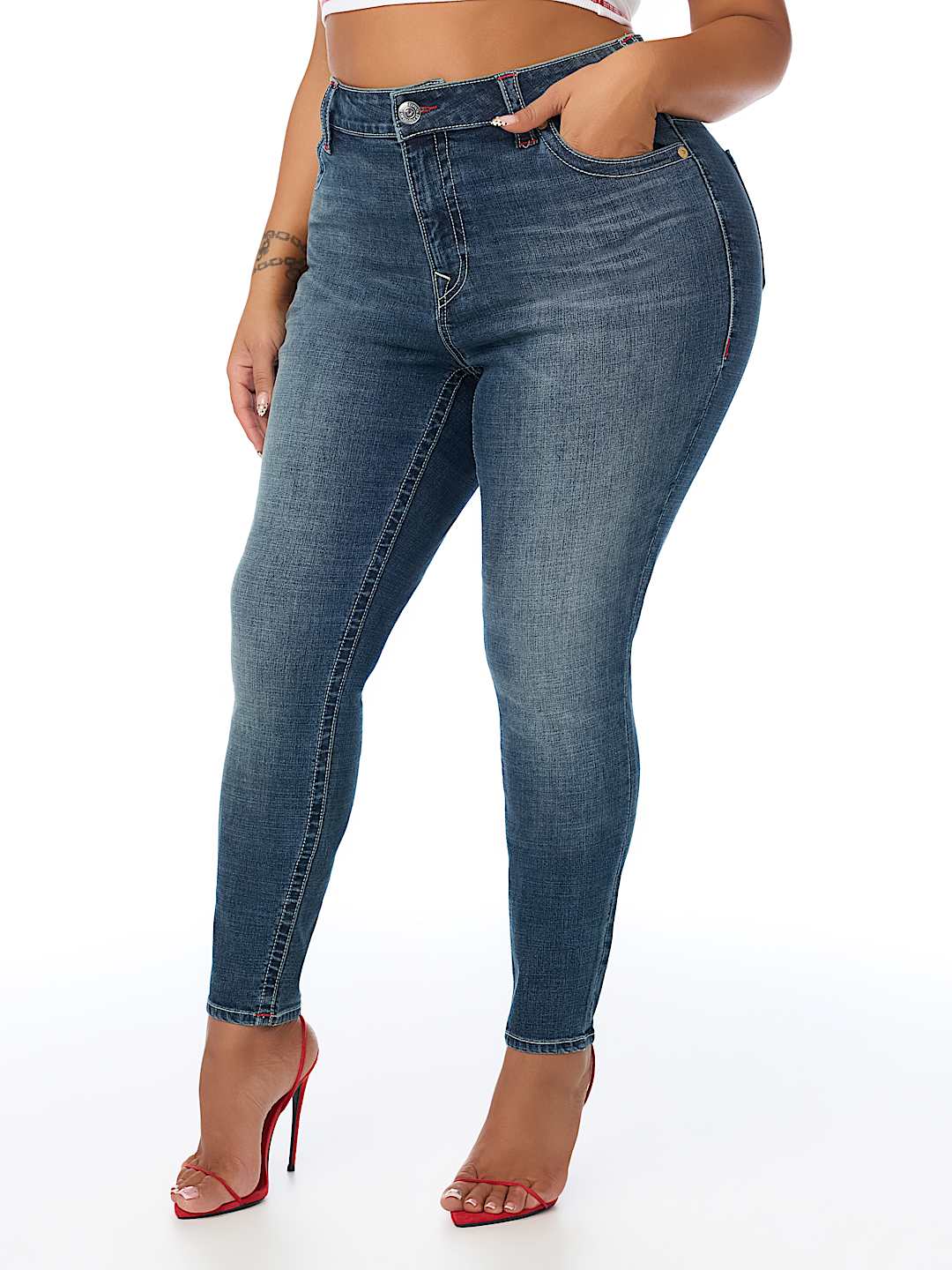 PLUS JENNIE MID RISE EMBROIDERED CURVY SKINNY JEAN 