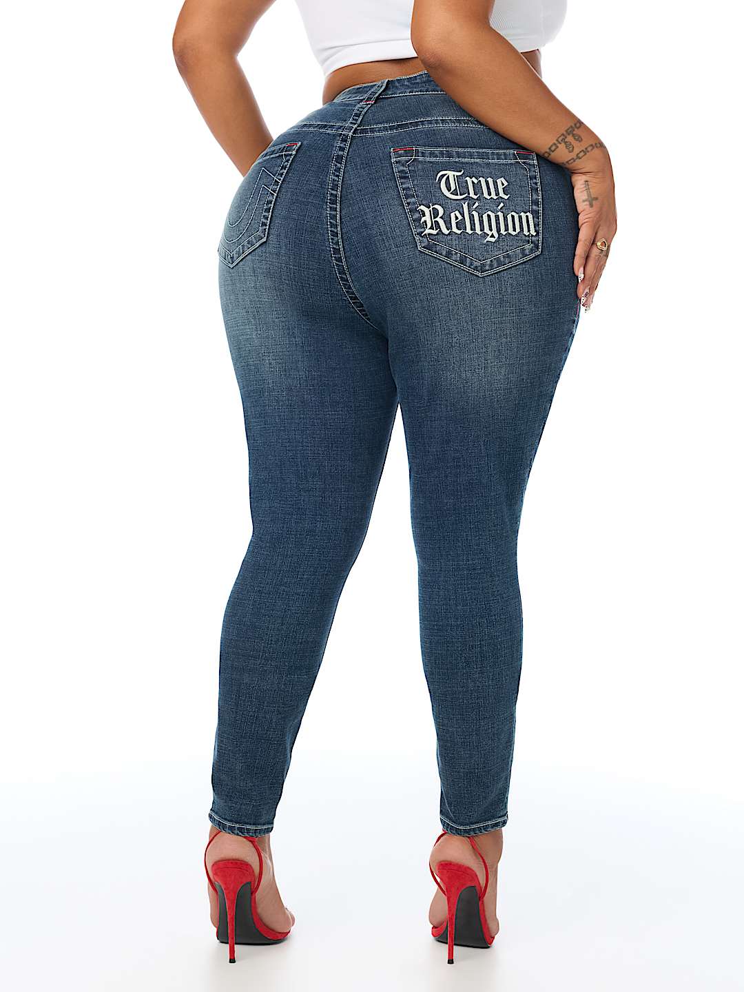 PLUS JENNIE MID RISE EMBROIDERED CURVY SKINNY JEAN 