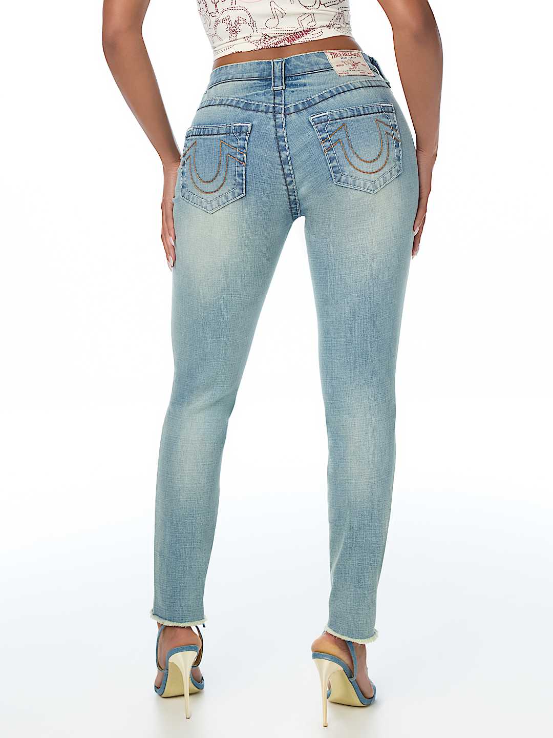 JENNIE MID RISE BIG T CURVY SKINNY JEAN