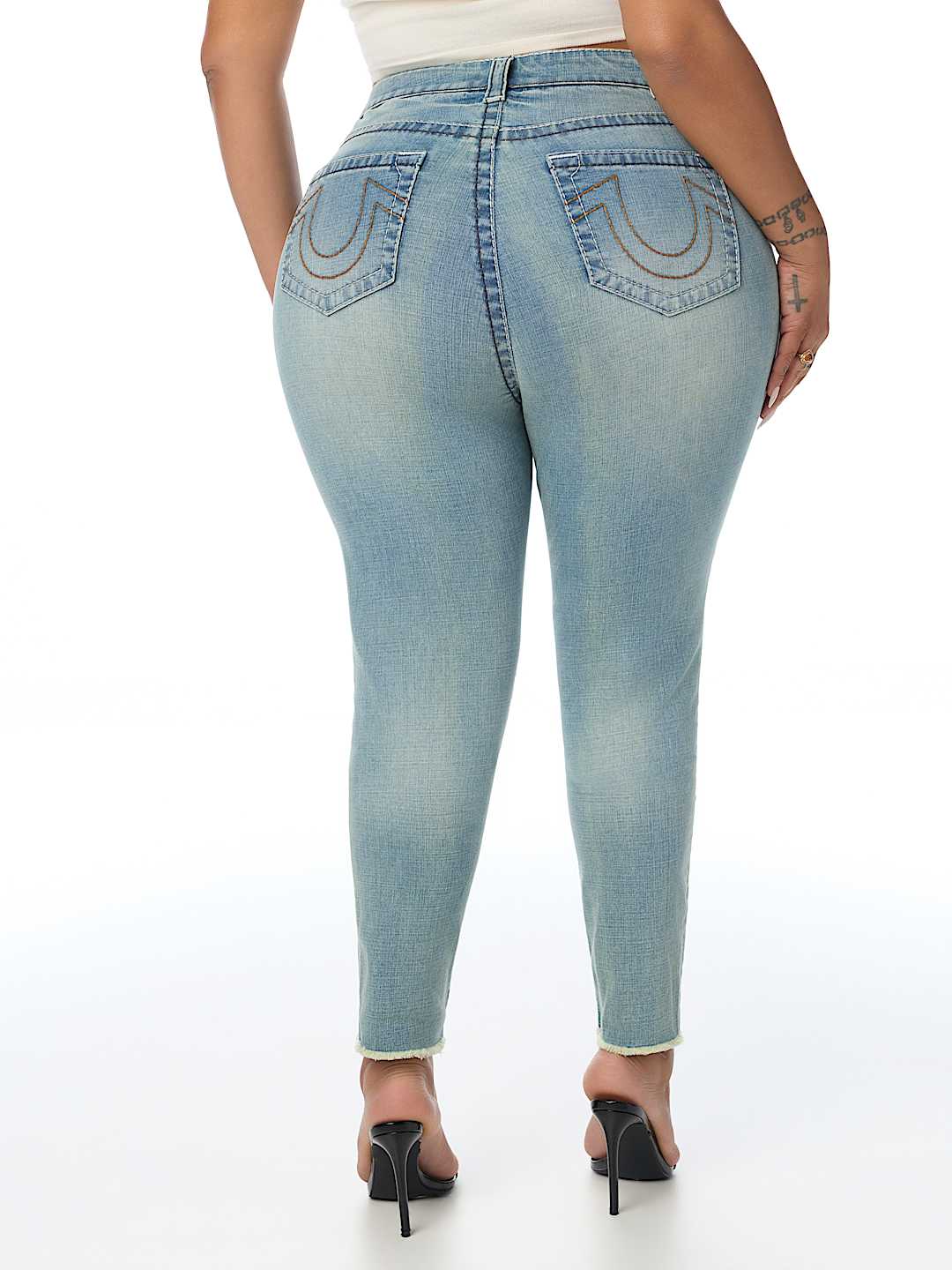 PLUS JENNIE MID RISE BIG T CURVY SKINNY JEAN