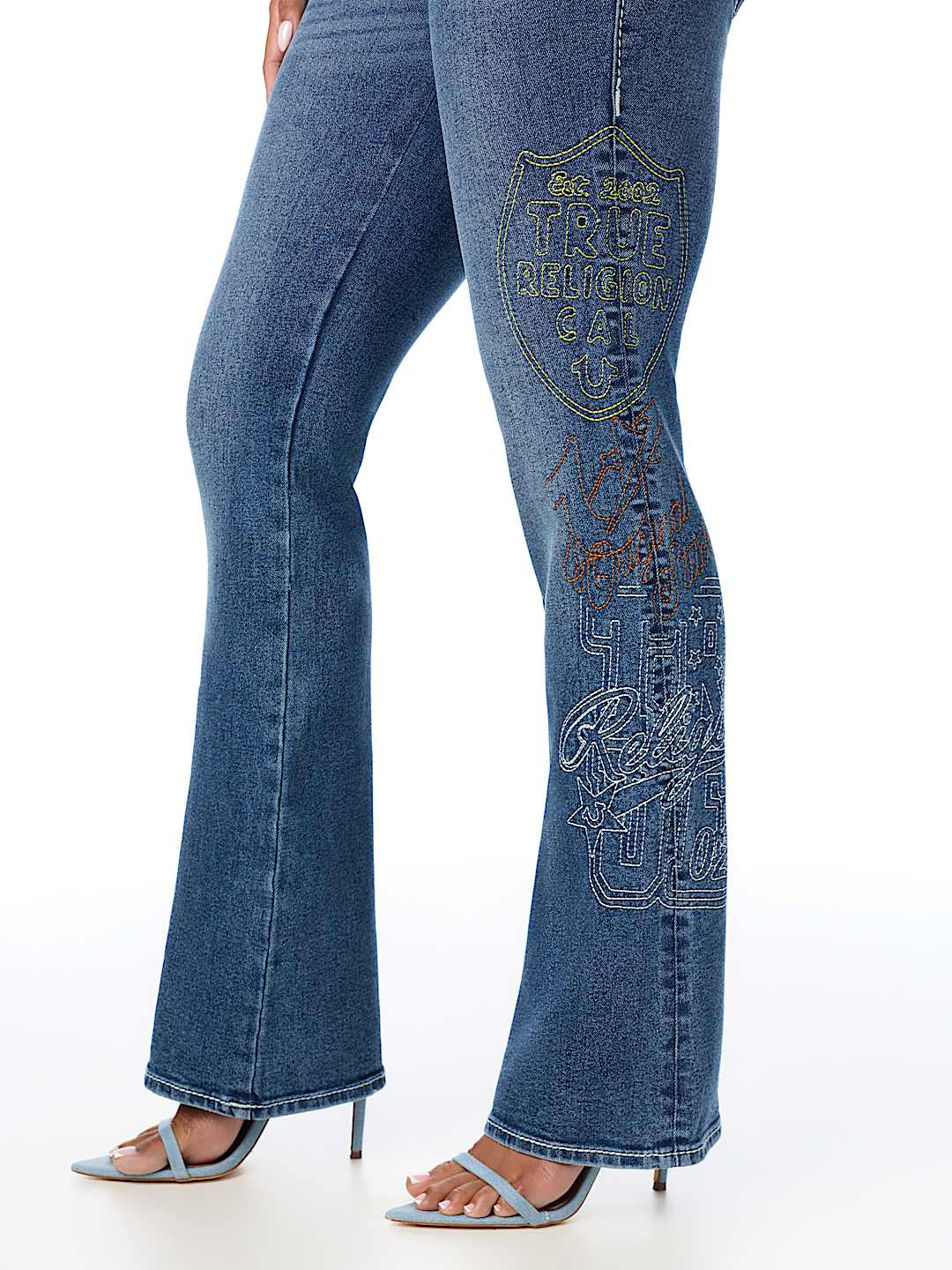 BECCA MID RISE EMBROIDERED BIG T FLAP BOOTCUT JEAN