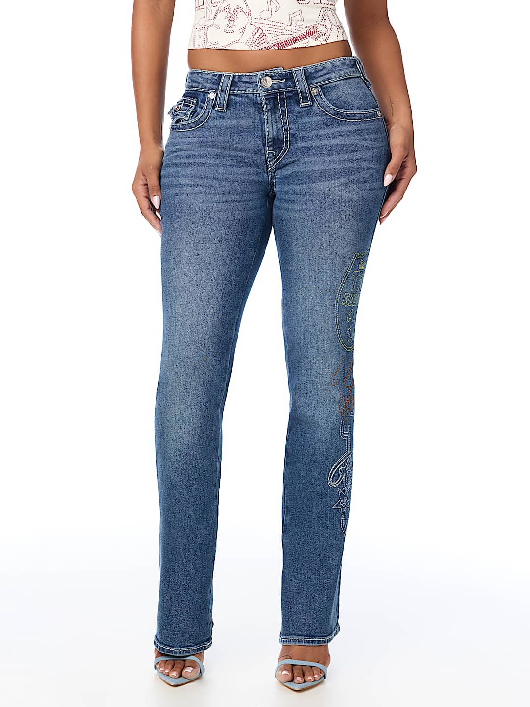 BECCA MID RISE EMBROIDERED BIG T FLAP BOOTCUT JEAN