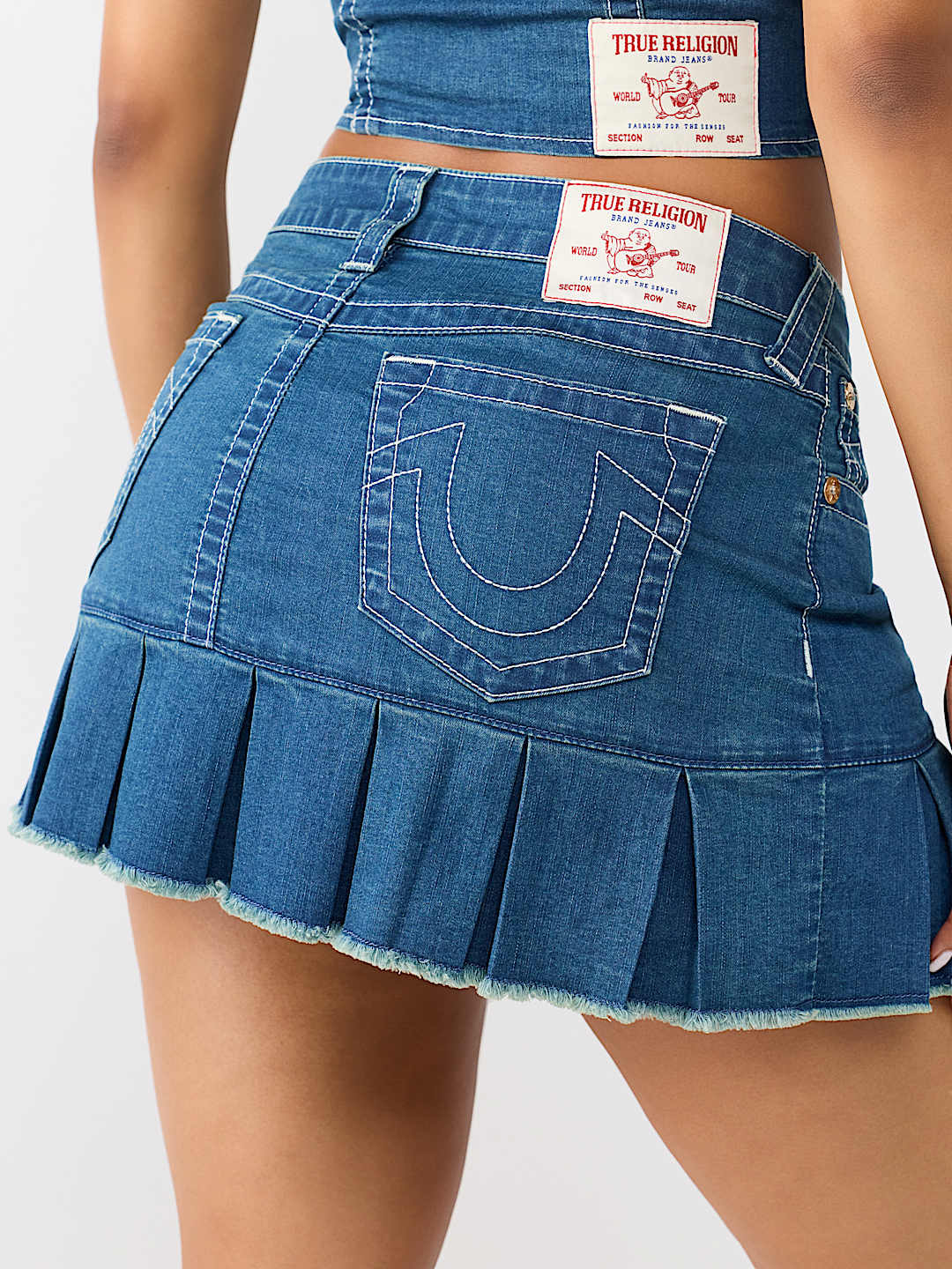 CHAIN BELT PLEATED MINI SKIRT