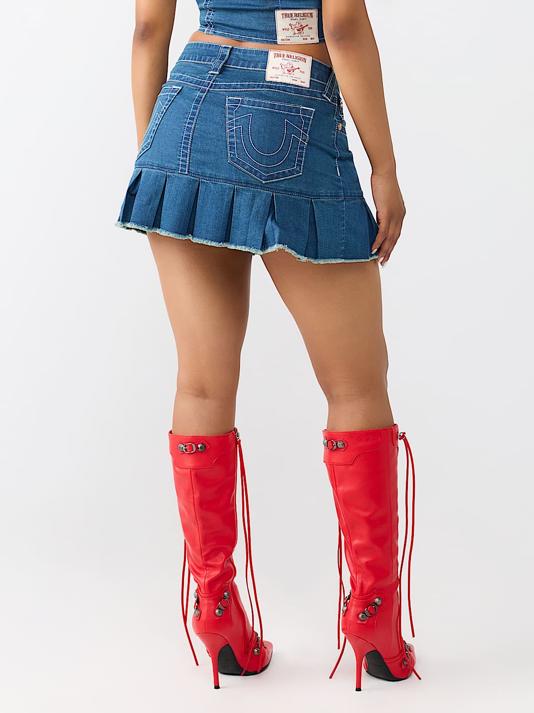 CHAIN BELT PLEATED MINI SKIRT