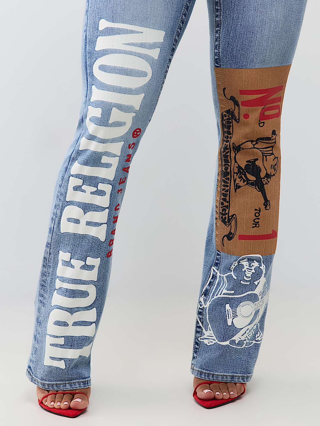 BECCA MID RISE PRINT FLAP BOOTCUT JEAN