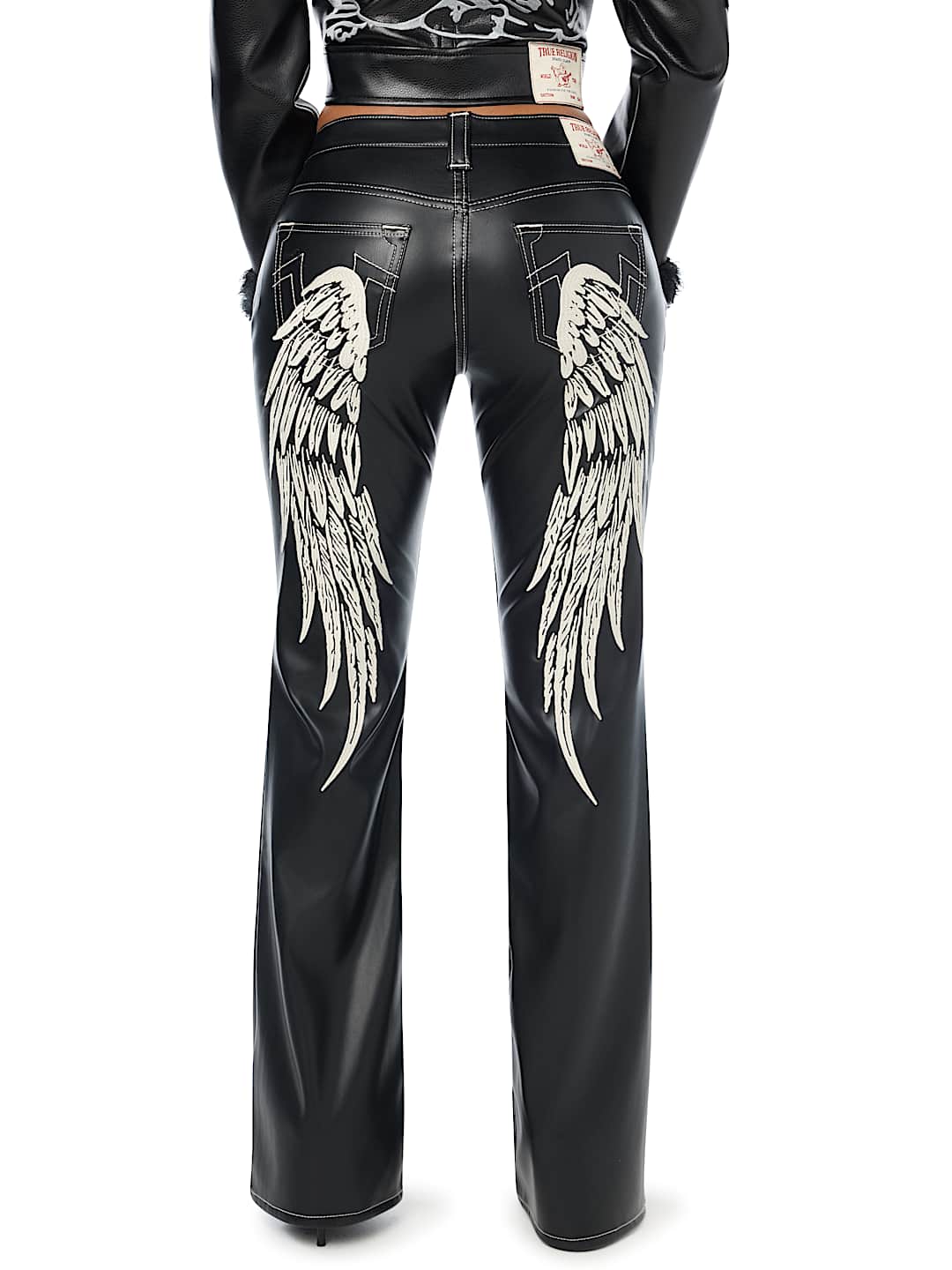BECCA MID RISE EMBROIDERED WING FAUX LEATHER BOOTCUT JEAN