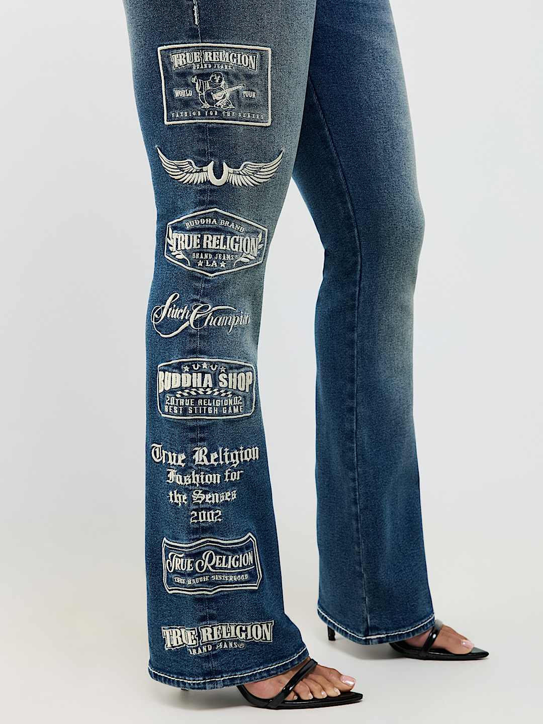 BECCA MID RISE EMBROIDERED LOGO BIG T BOOTCUT JEAN