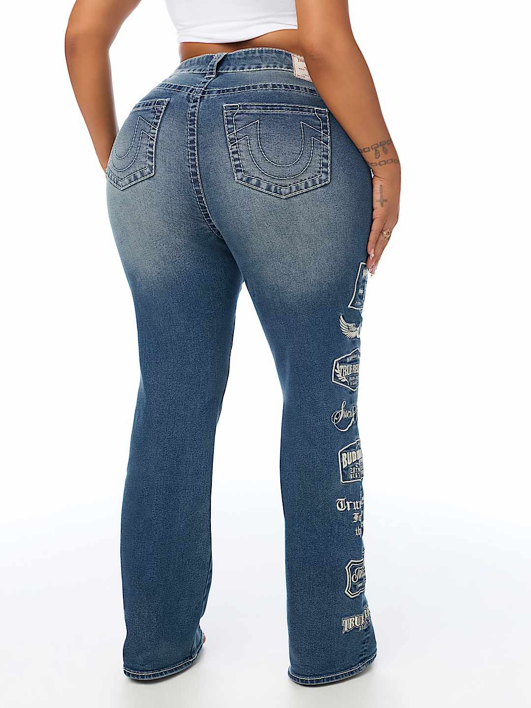 PLUS BECCA MID RISE EMBROIDERED LOGO BIG T BOOTCUT JEAN