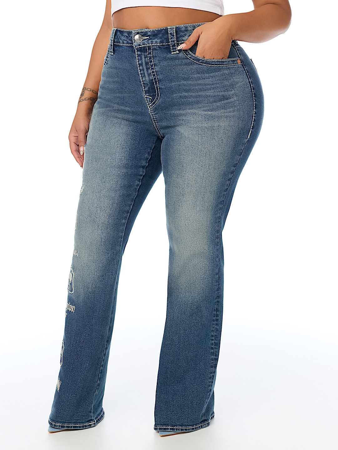 PLUS BECCA MID RISE EMBROIDERED LOGO BIG T BOOTCUT JEAN