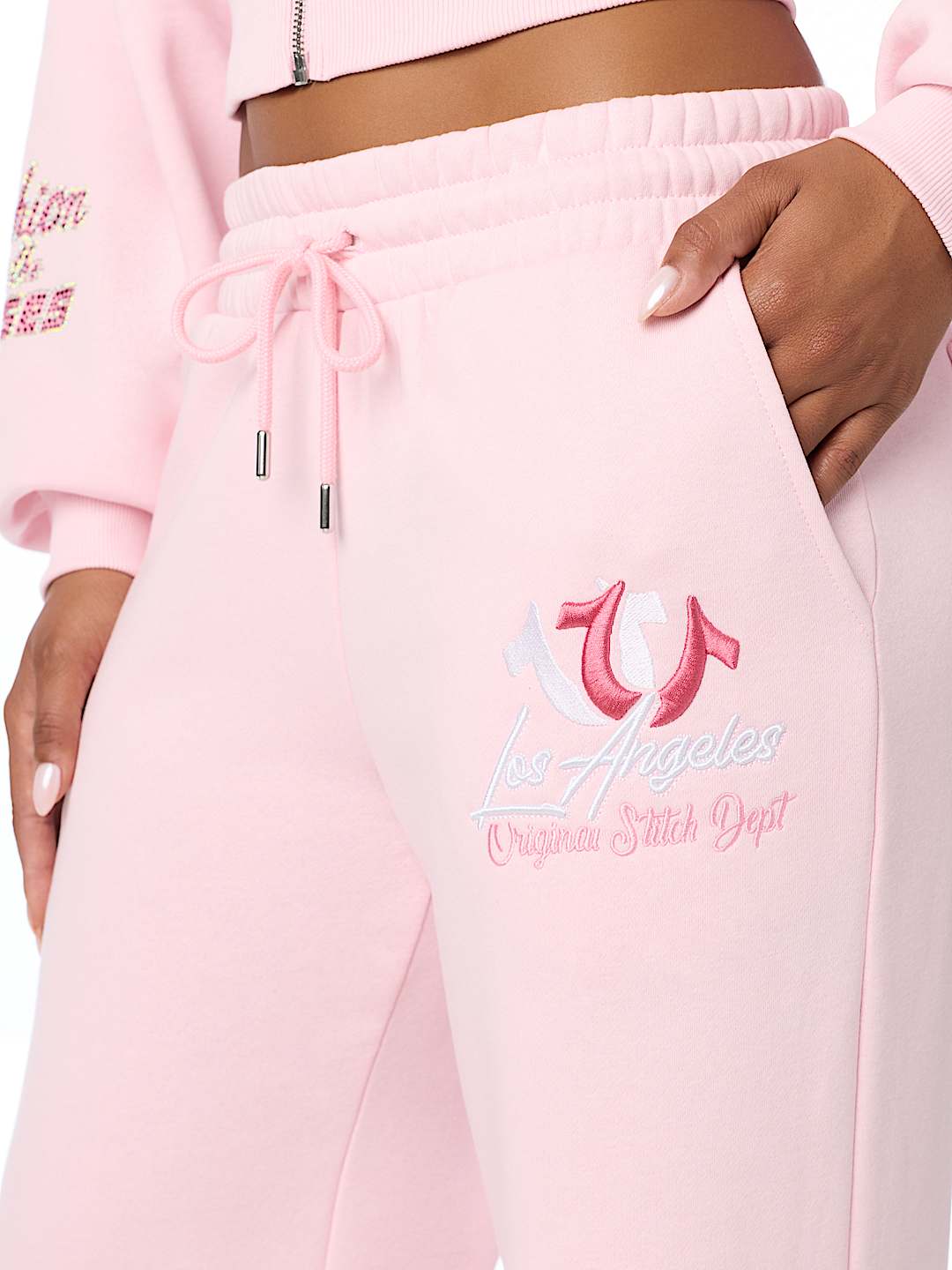EMBROIDERED MID RISE WIDE LEG SWEATPANT