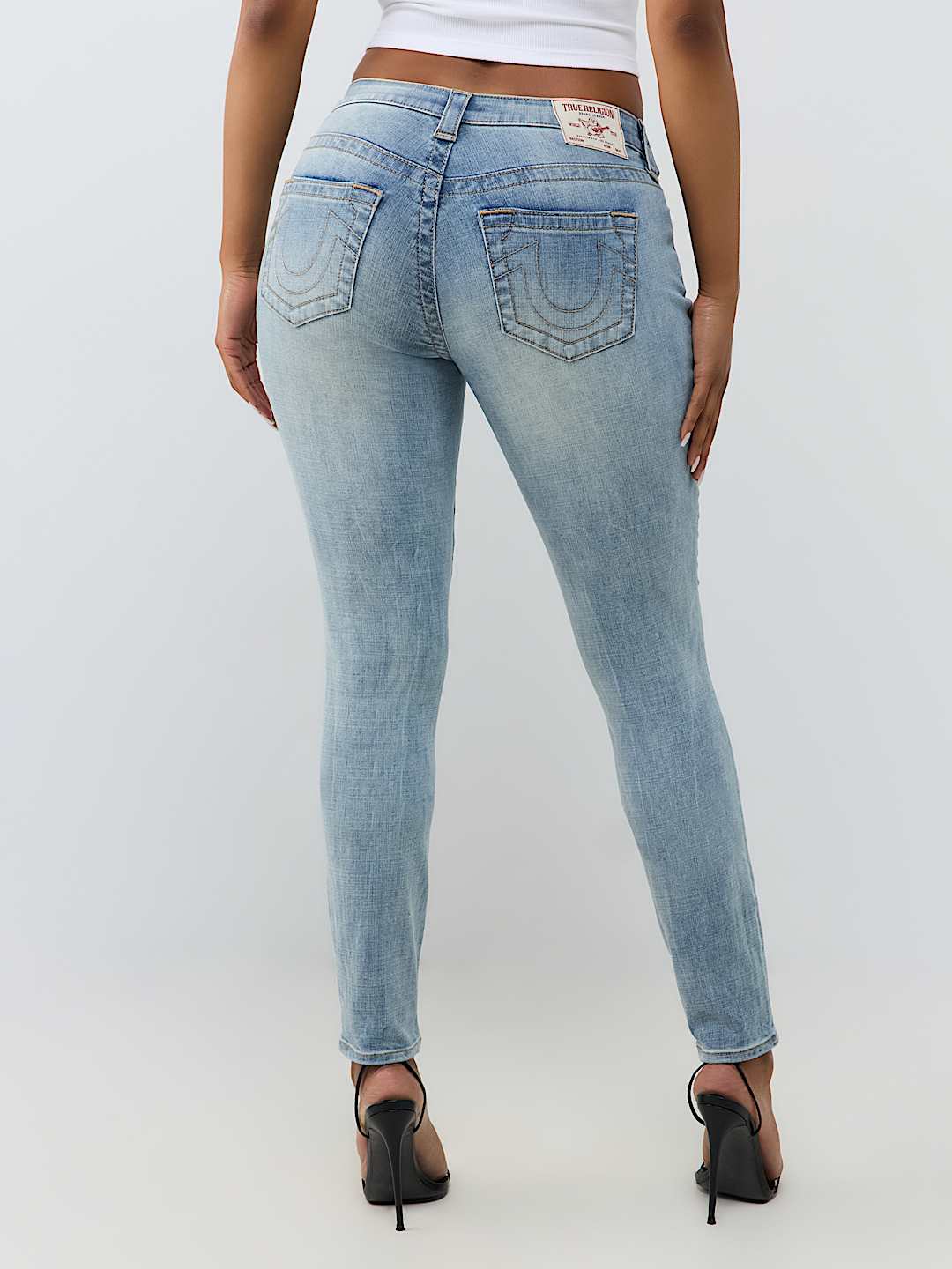 JENNIE MID RISE CURVY SKINNY JEAN