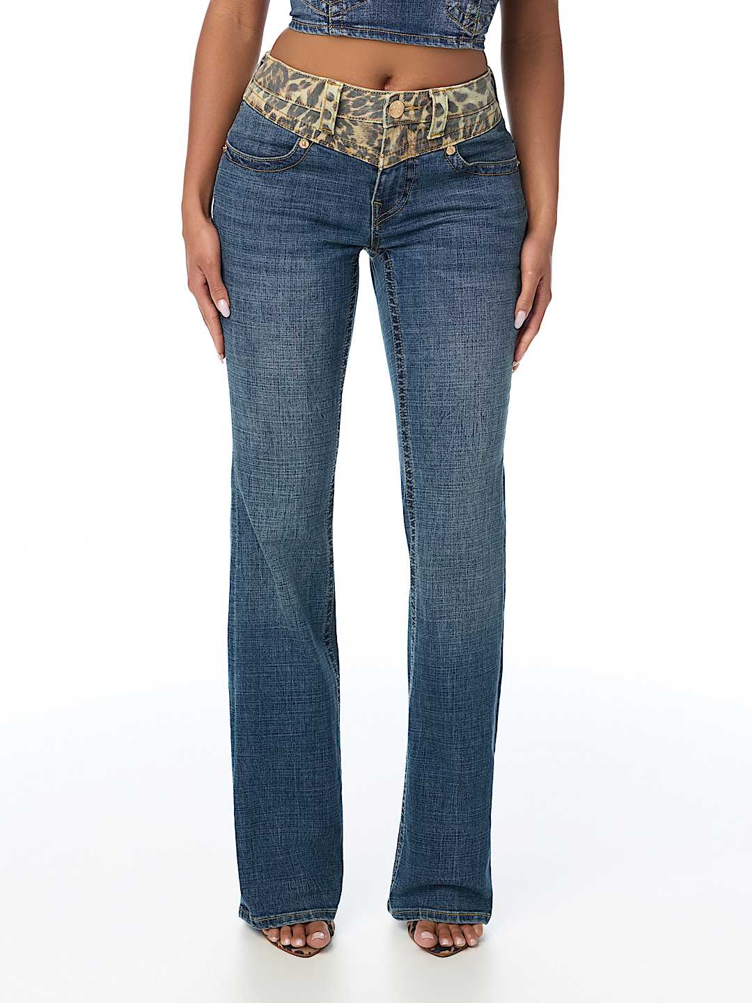 BECCA MID RISE LEOPARD BLOCK FLAP BOOTCUT JEAN