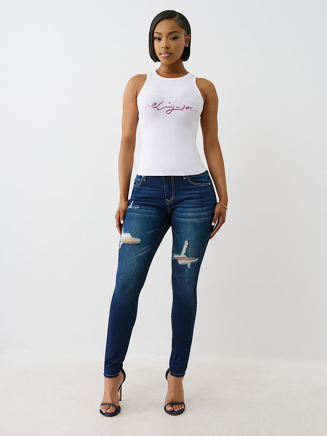 JENNIE MID RISE DISTRESSED CURVY SKINNY JEAN