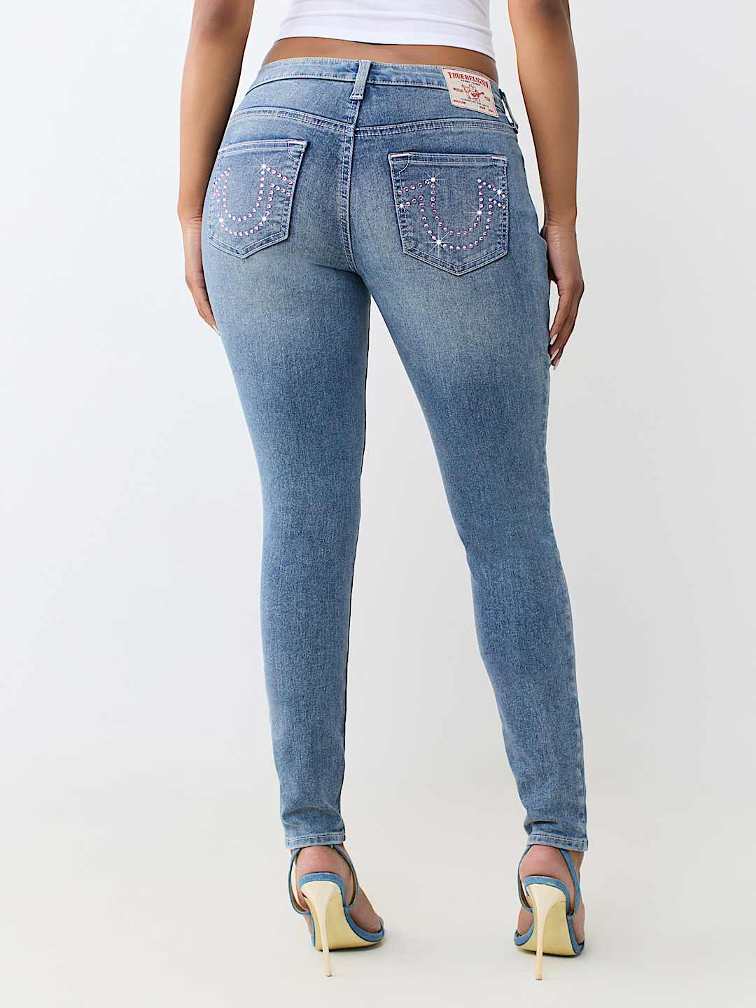 JENNIE MID RISE CRYSTAL CURVY SKINNY JEAN