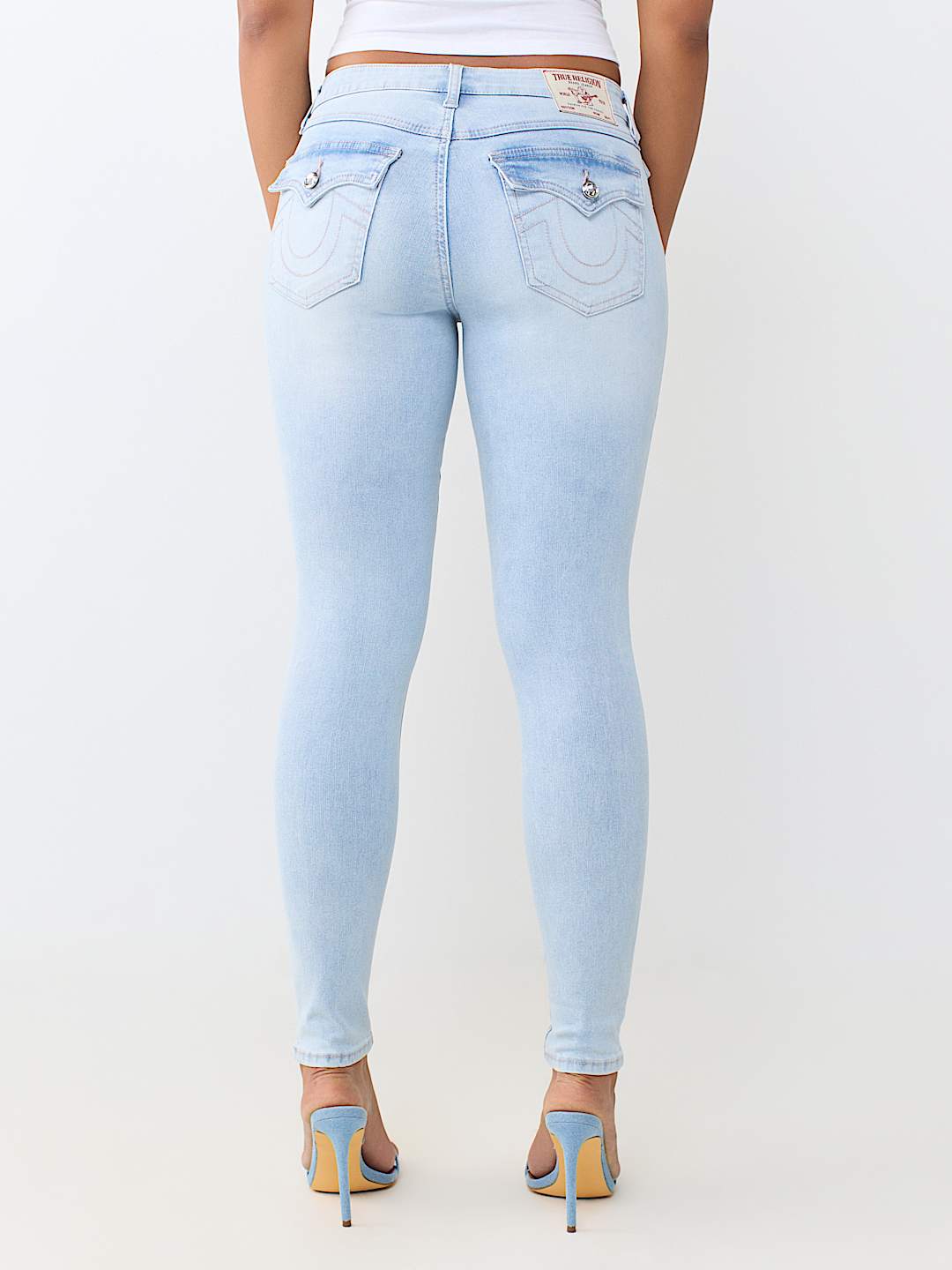 JENNIE MID RISE FLAP CURVY SKINNY JEAN