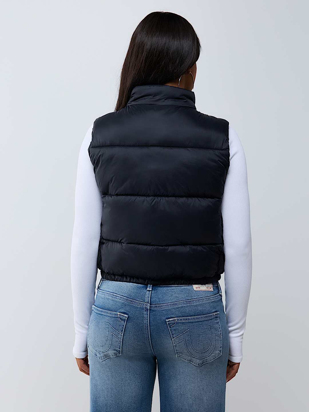 CHALECO ACOLCHADO CON ESTAMPADO INTEGRAL