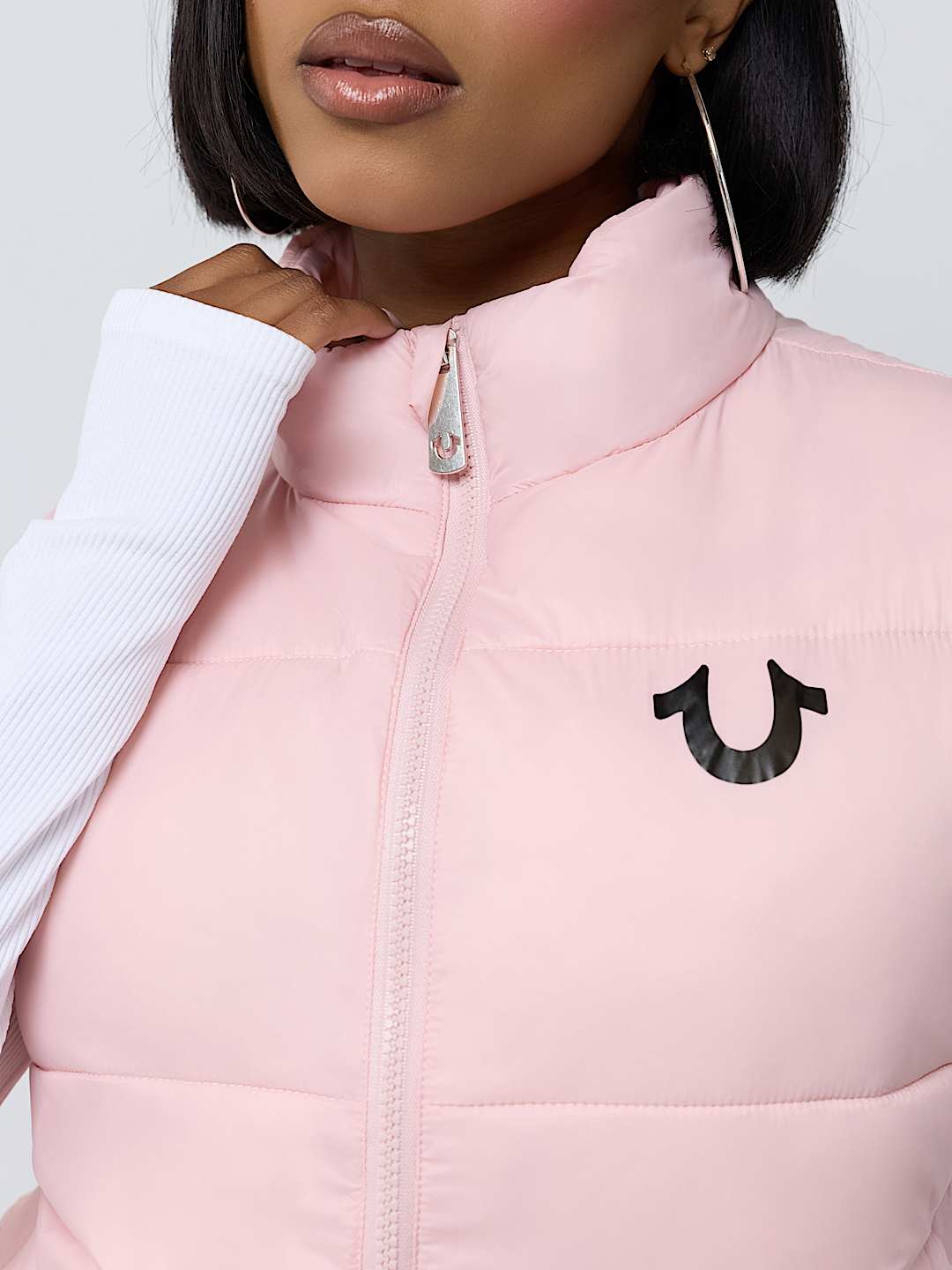 CHALECO ACOLCHADO CON ESTAMPADO INTEGRAL