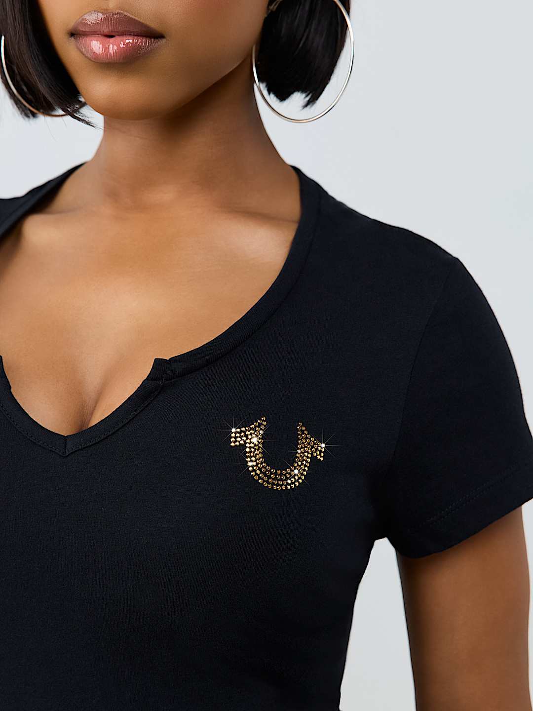 HORSESHOE NOTCH BABY TEE