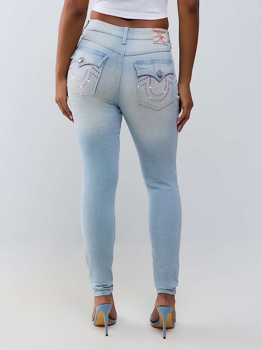 JENNIE MID RISE CRYSTAL HORSESHOE FLAP CURVY SKINNY JEAN