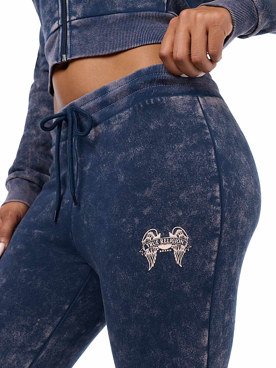 WASHED WING TWISTED FLARE SWEATPANT