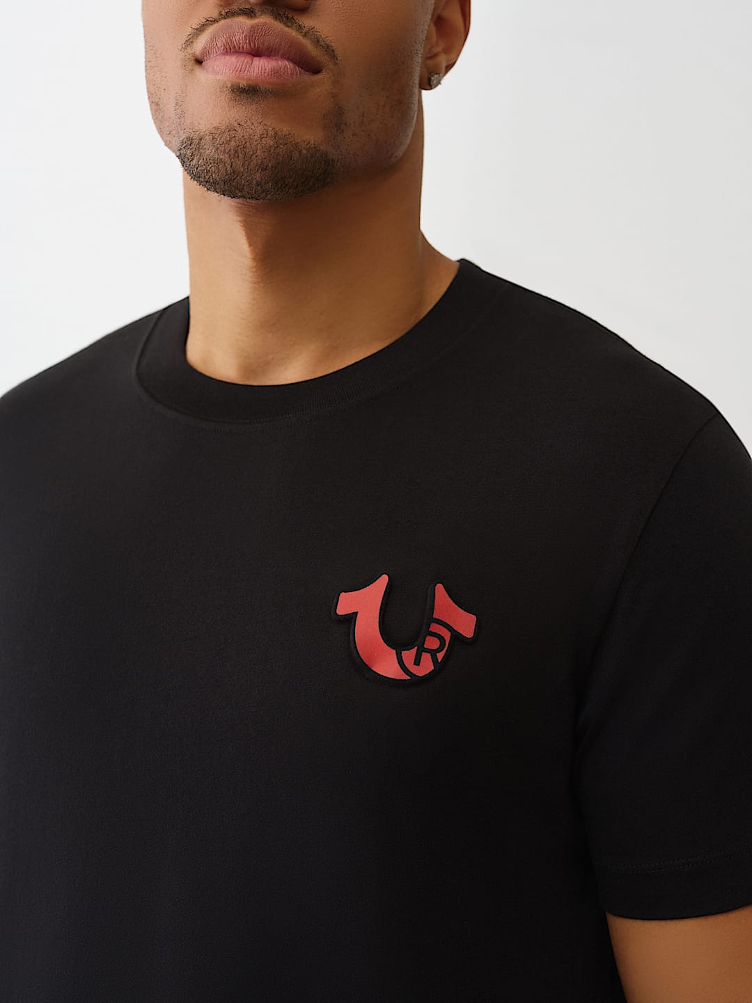 EMBOSSED LOGO TEE