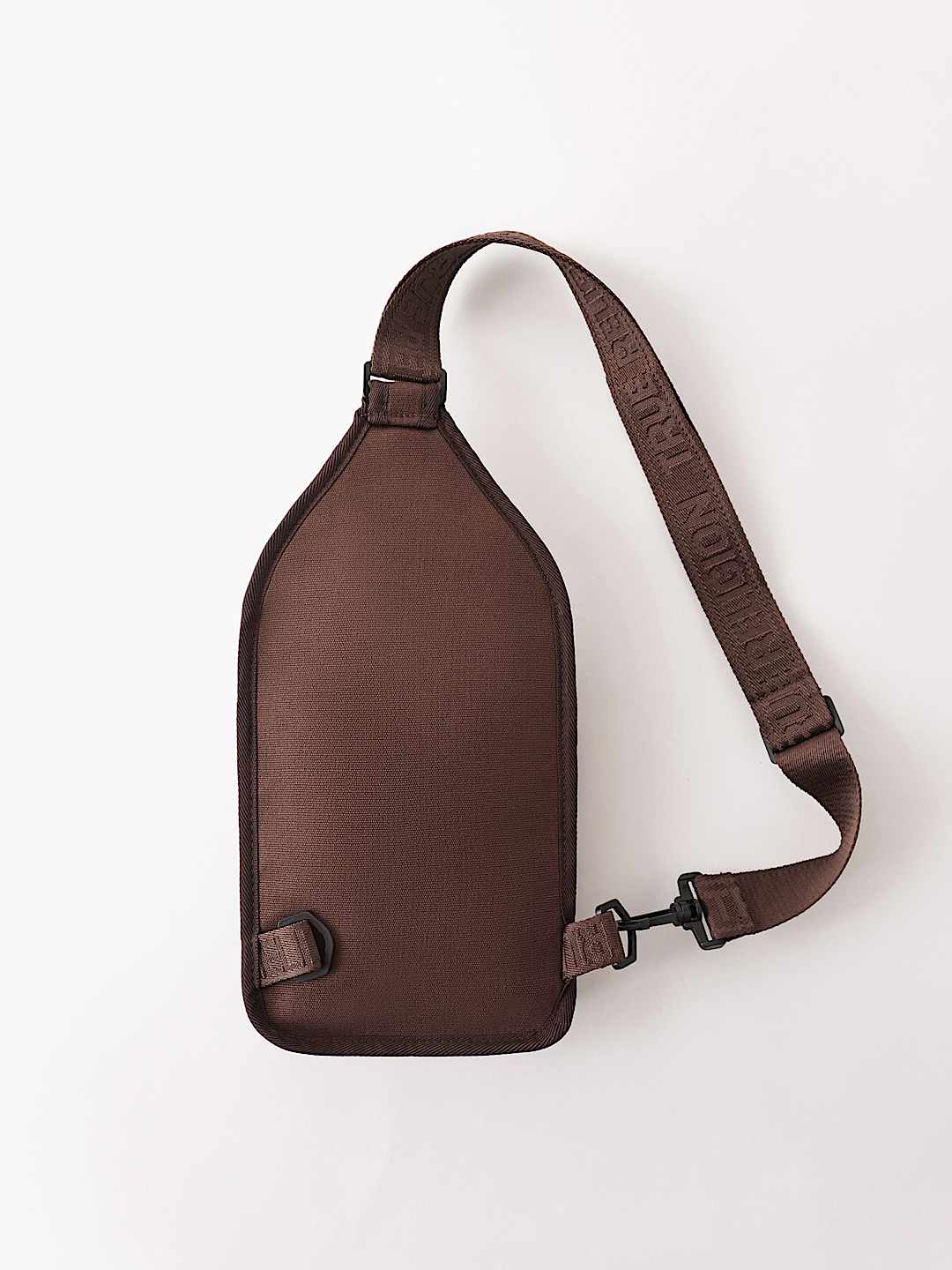 ALLOVER PRINT PATCH SLING BAG
