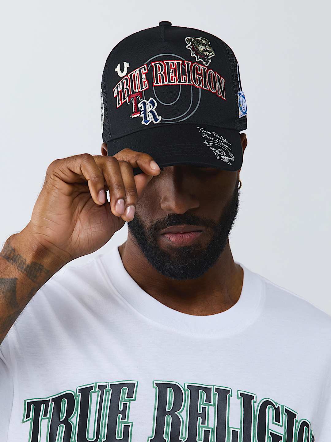 MULTI-LOGO TRUCKER HAT