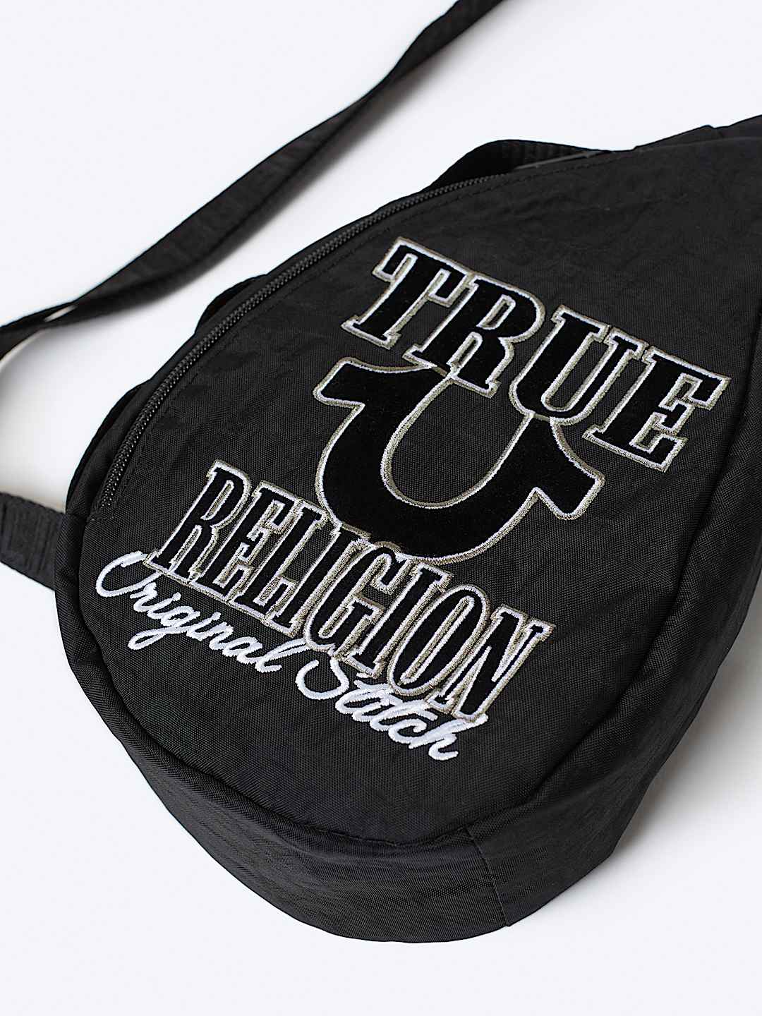HORSESHOE SCRIPT SLING BAG