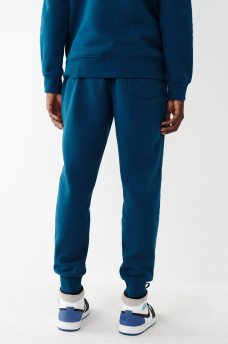 PANTALONES DEPORTIVOS CON LOGOTIPO