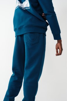 PANTALONES DEPORTIVOS CON LOGOTIPO