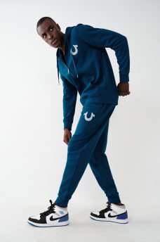 PANTALONES DEPORTIVOS CON LOGOTIPO