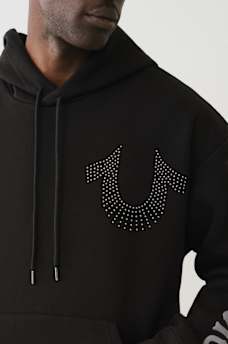 SUDADERA CON CAPUCHA Y HERRADURA CON TACHAS