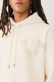 SUDADERA CON CAPUCHA Y HERRADURA CON TACHAS