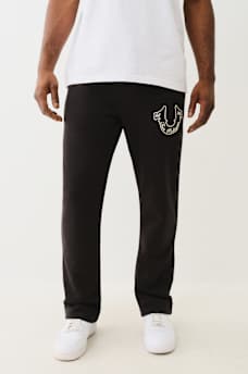 PANTAL&Oacute;N DEPORTIVO CON HERRADURA PROPERTY OF NONE