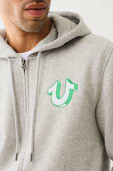 SUDADERA CON CAPUCHA Y CIERRE DE ESTILO GRAFFITI