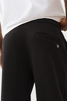 PANTALON EN MOLLETON AMPLE &Agrave; FERMETURES &Eacute;CLAIR