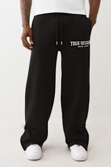 PANTALON EN MOLLETON AMPLE &Agrave; FERMETURES &Eacute;CLAIR