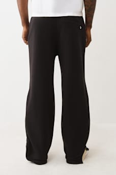 PANTALON EN MOLLETON AMPLE &Agrave; FERMETURES &Eacute;CLAIR