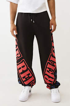 OVERT ARCHED LOGO BAGGY JOGGER, image 1