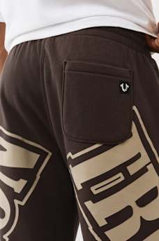 OVERT ARCHED LOGO BAGGY JOGGER, image 2