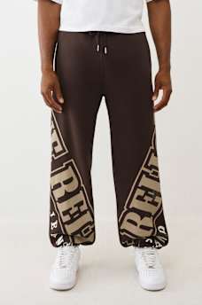 OVERT ARCHED LOGO BAGGY JOGGER, image 1