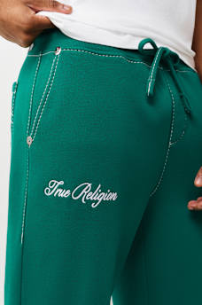 PANTALONES DEPORTIVOS HOLGADOS BIG T CON ESCUDO DE TR, image 4