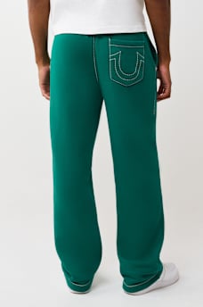 PANTALONES DEPORTIVOS HOLGADOS BIG T CON ESCUDO DE TR, image 6