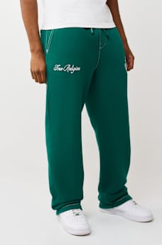 PANTALONES DEPORTIVOS HOLGADOS BIG T CON ESCUDO DE TR, image 1