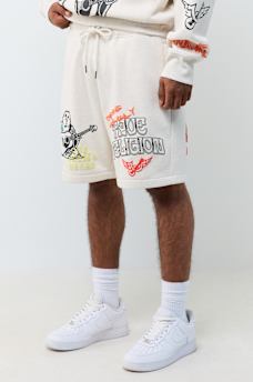 SHORT EN MOLLETON AVEC LOGOS DESSIN&Eacute;S