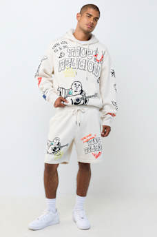 SHORT EN MOLLETON AVEC LOGOS DESSIN&Eacute;S
